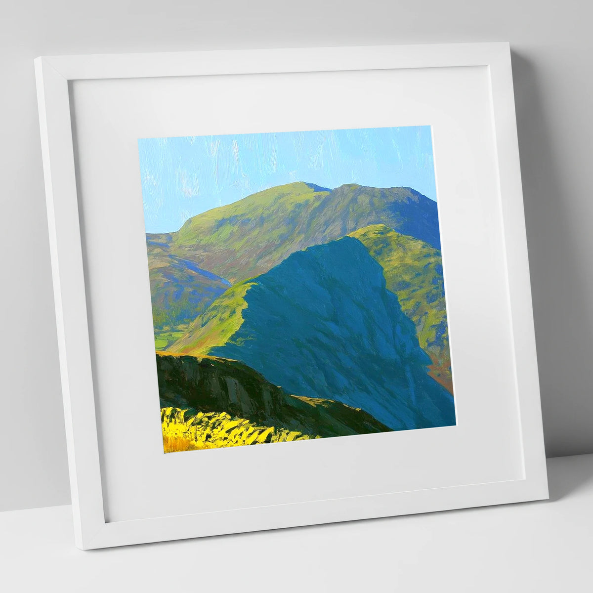 Sunlit Crags of Wetherlam Ridge lake district fell art print in white frame