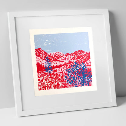 Vibrant Red Borrowdale Fells lake district valley art print in white frame