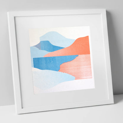 Graphic Lake Reflections In Coral lake district lake art print in white frame
