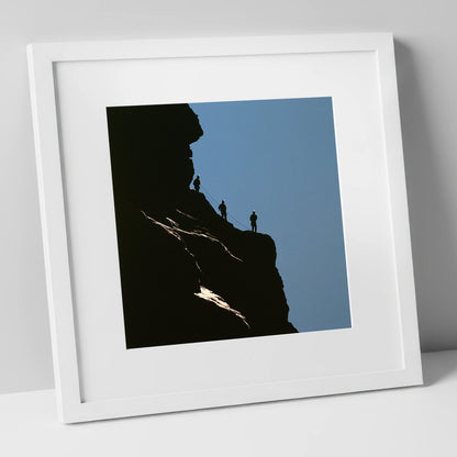 Silhouetted Climbers on a Crag lake district walking art print in white frame