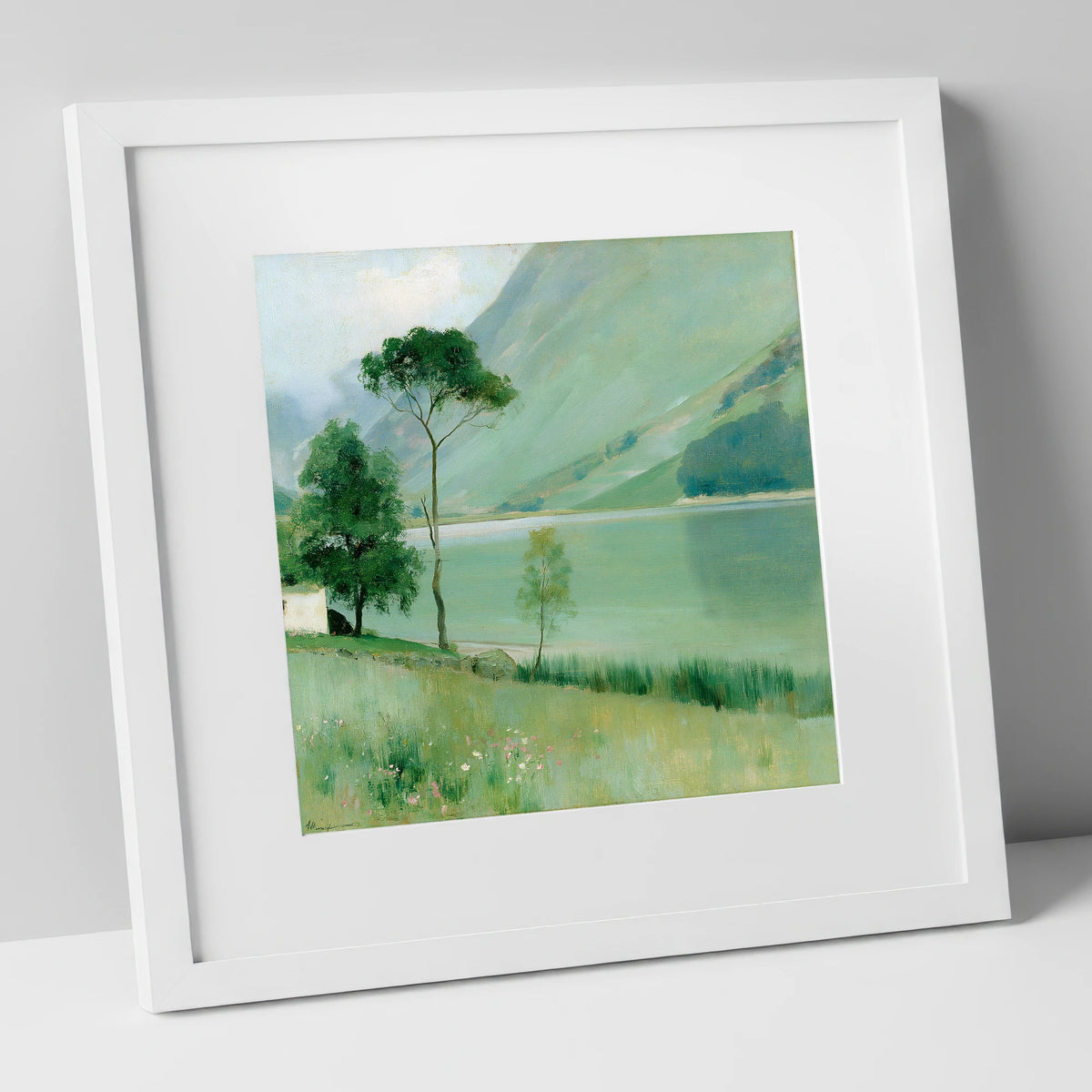 Buttermere in Soft Sage Green lake district lake art print in white frame