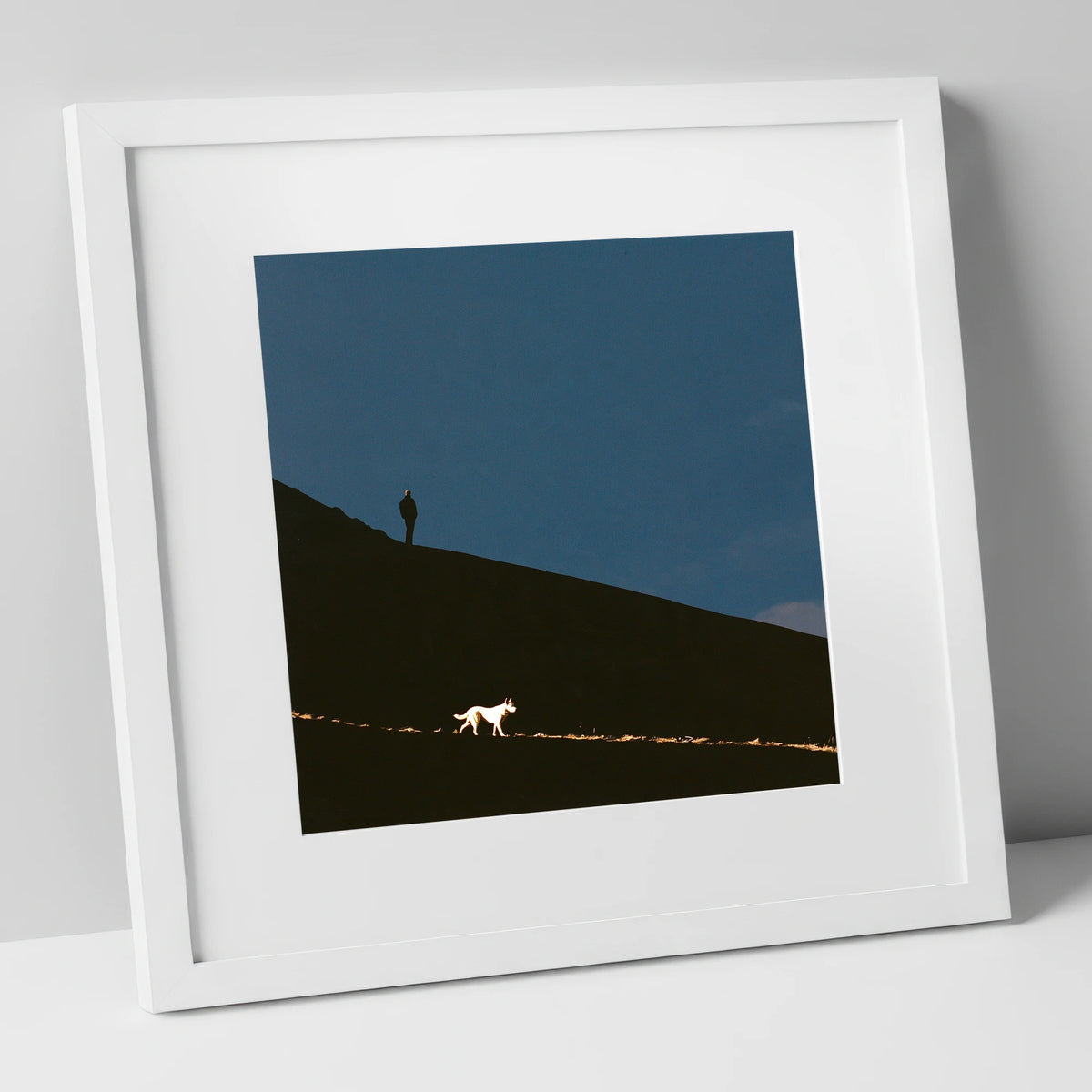 Skiddaw Silhouette Walker and Dog gifts for dog walkers art print in white frame