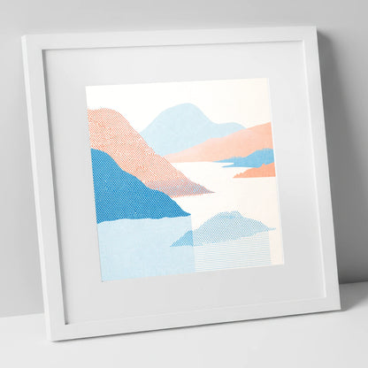 Ullswater Fells in Coral and Blue lake district lake art print in white frame