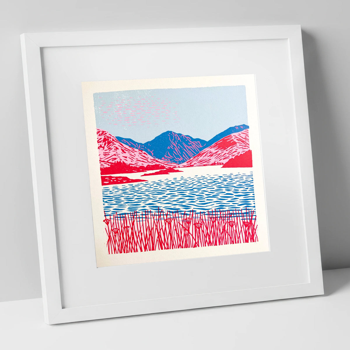 Vibrant Pink Fells and Lake lake district lake art print in white frame