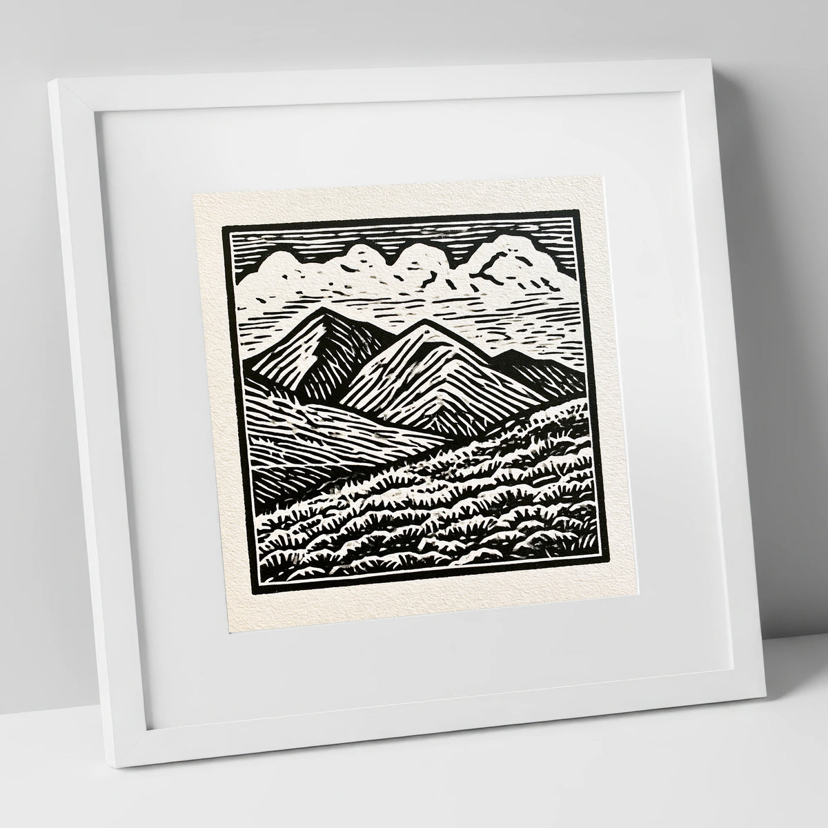 Monochrome Rolling Fells Under Cloud lake district fell art print in white frame