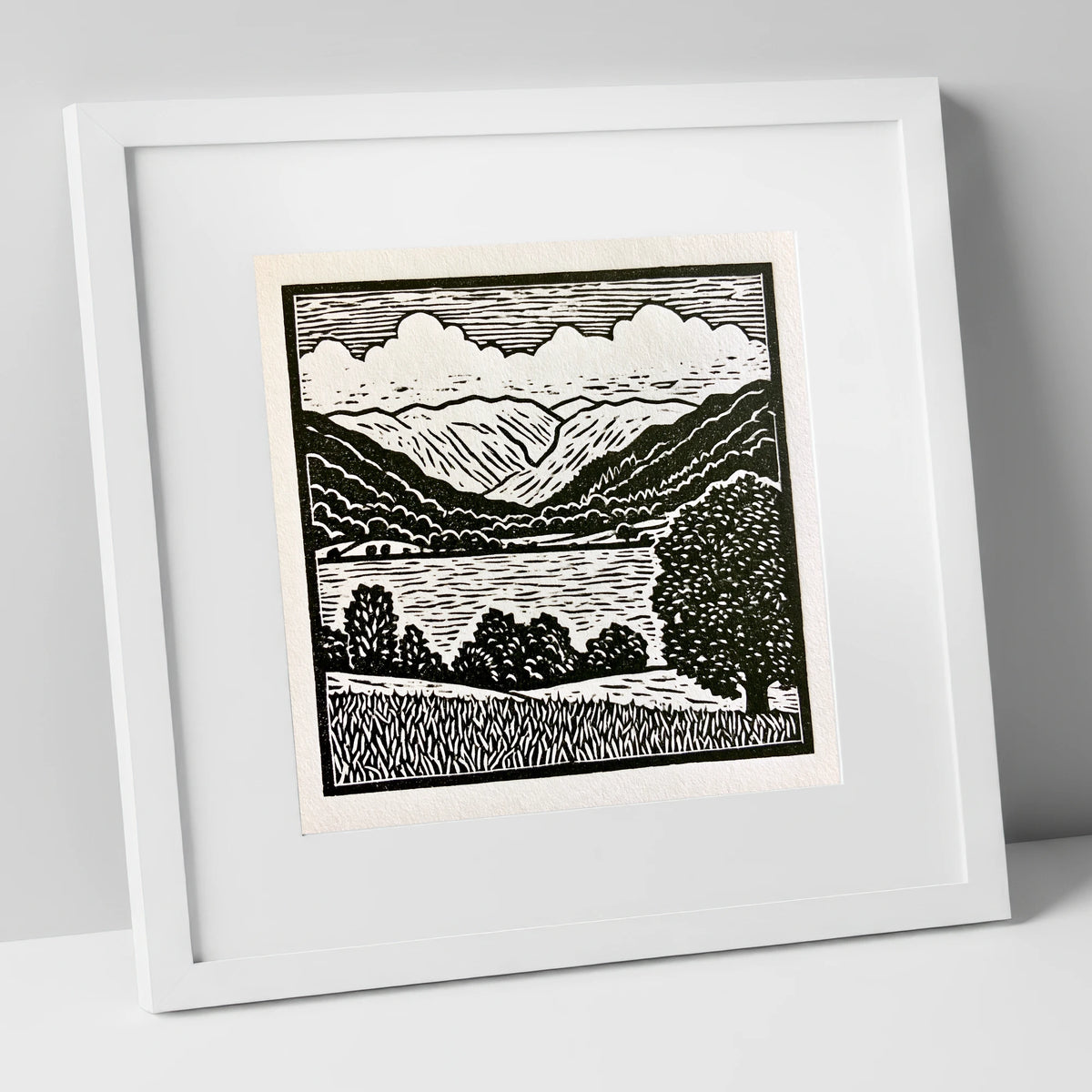 Grasmere and Fells in Monochrome lake district lake art print in white frame