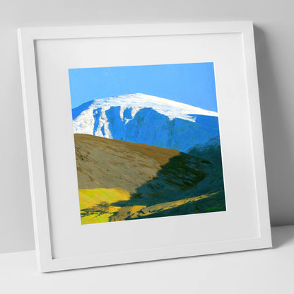 Sunlight on Snow Capped Raise lake district fell art print in white frame