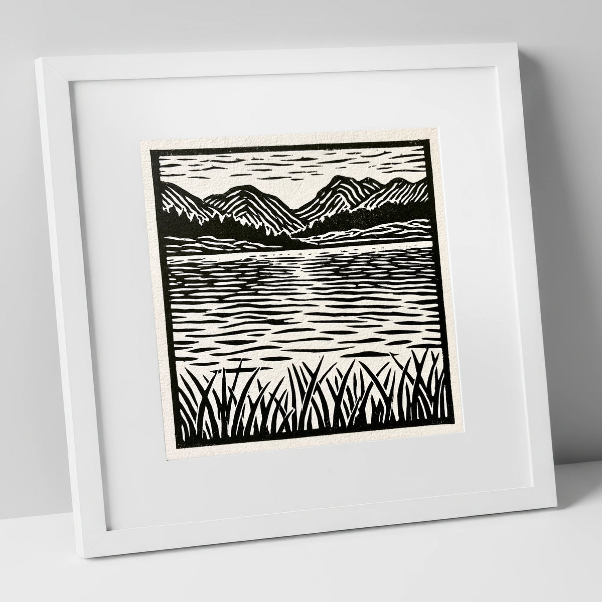 Calm Lake Reflections in Monochrome lake district lake art print in white frame