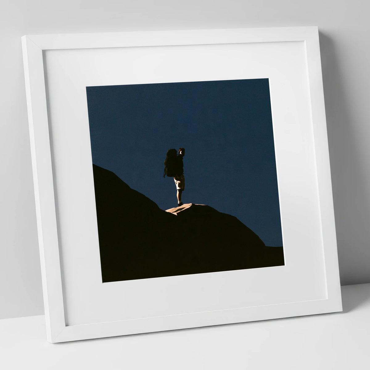 Hiker Silhouette on Dark Fell lake district walking art print in white frame