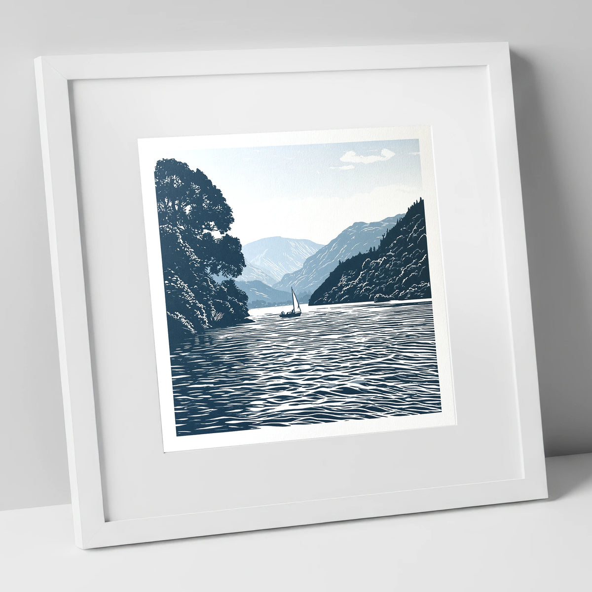 Ullswater Sailboat in Navy Blue lake district lake art print in white frame
