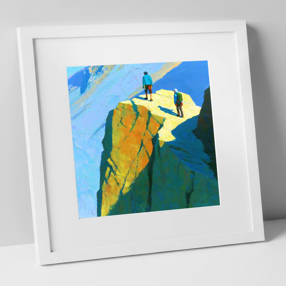 Mountaineers on Sunlit High Crags lake district walking art print in white frame