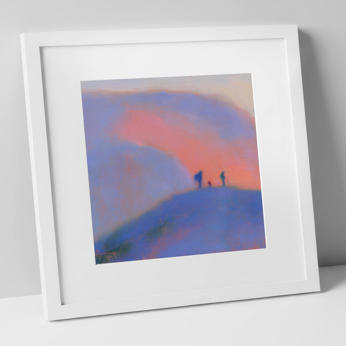 Hikers on a Twilight Fell lake district fell art print in white frame