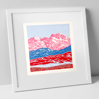 Bowfell in Bold Pink and Blue lake district fell art print in white frame