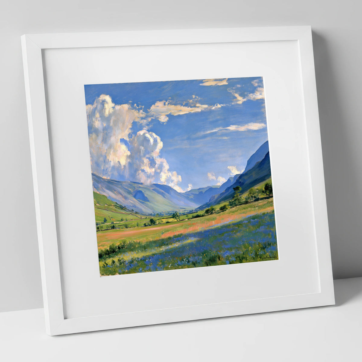 Sunlit Valley Under Billowing Clouds lake district valley art print in white frame