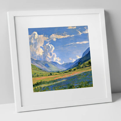 Sunlit Valley Under Billowing Clouds lake district valley art print in white frame
