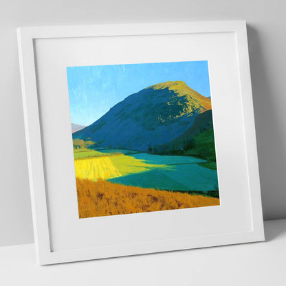 Sunlit Fields Below Low Fell lake district fell art print in white frame
