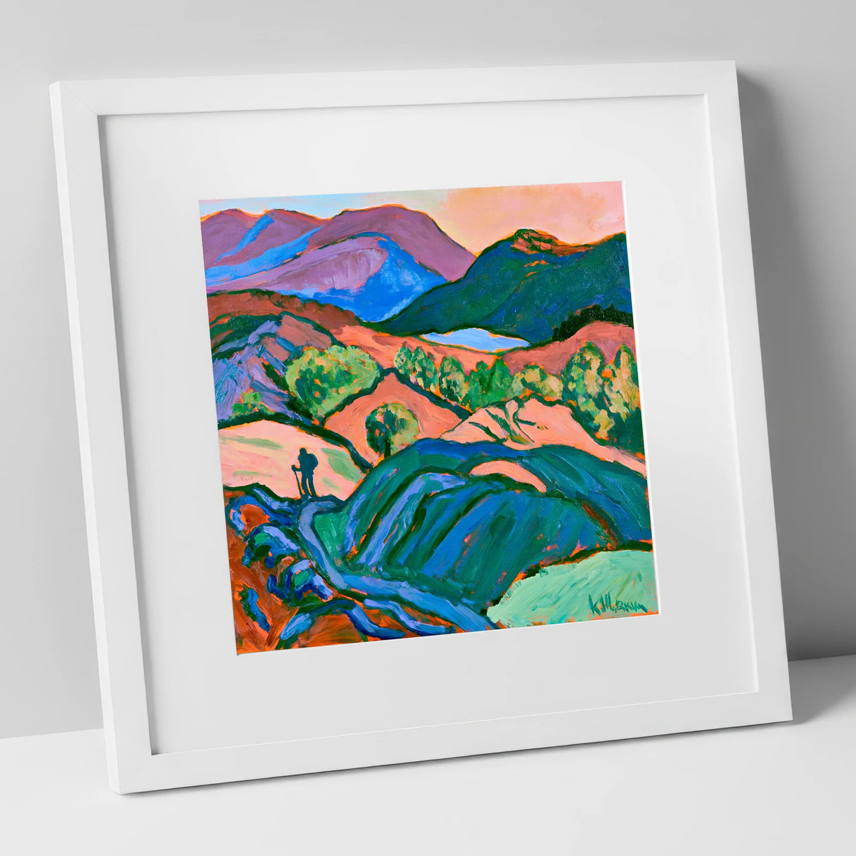 Hiker Silhouette in Vibrant Fells lake district walking art print in white frame