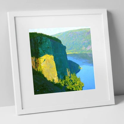 Luminous Sunlight on Raven Crag lake district fell art print in white frame