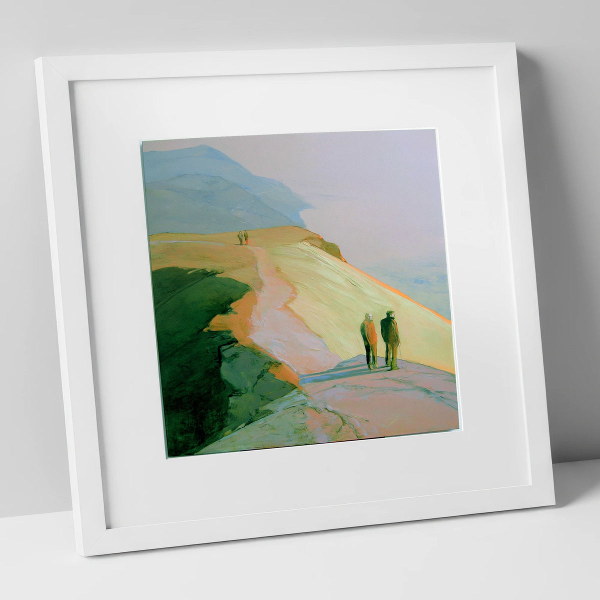 Hikers on a Golden Fell lake district fell art print in white frame