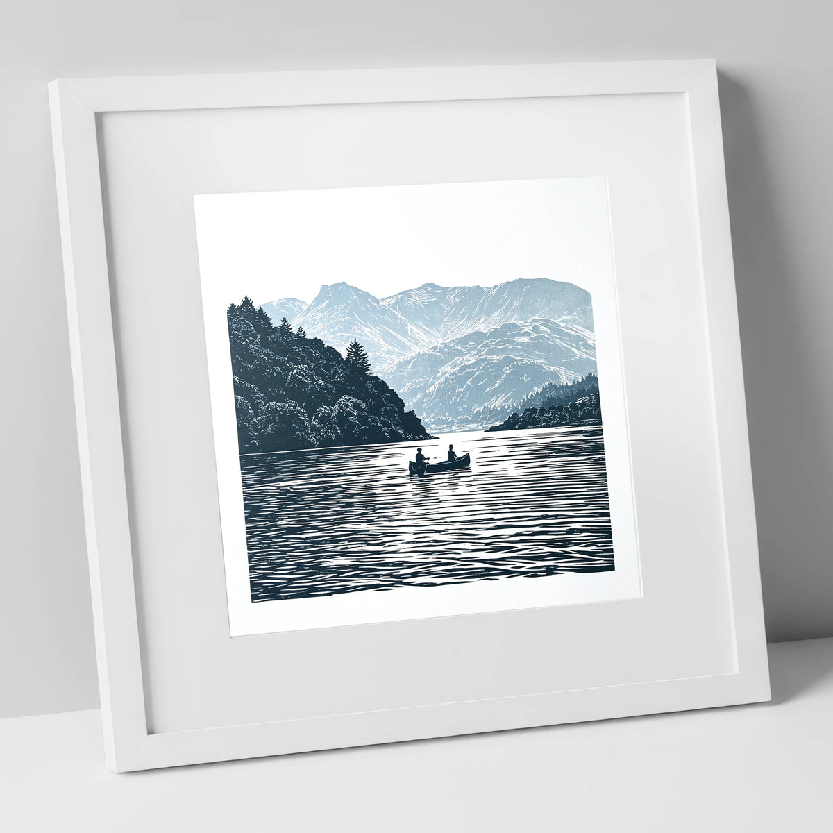 Windermere Canoe In Deep Blue lake district lake art print in white frame
