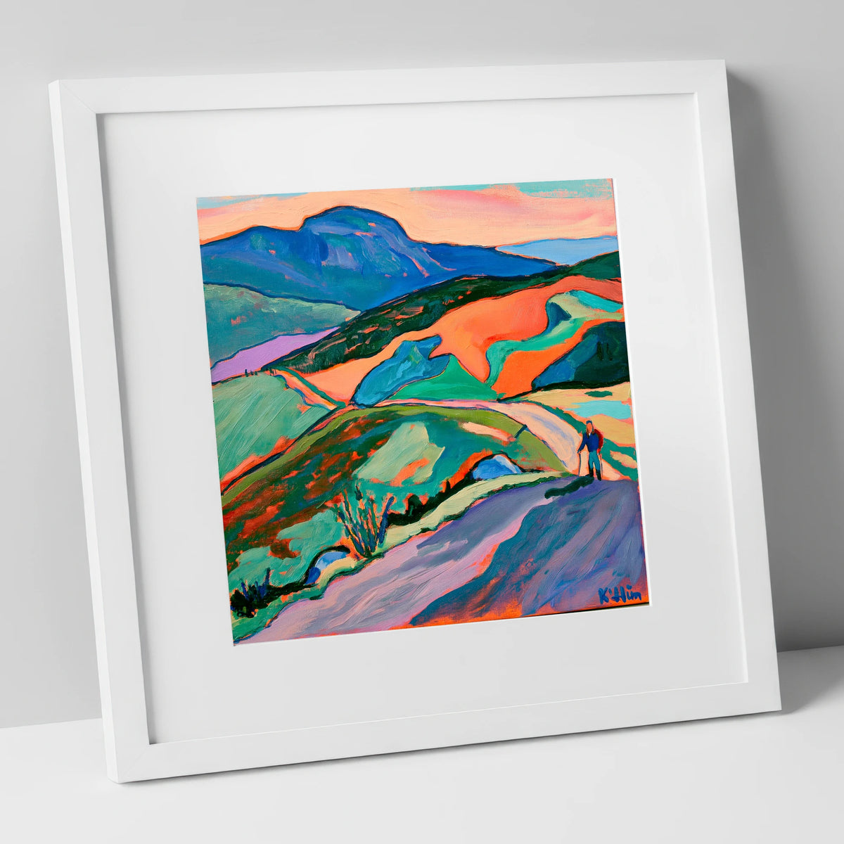 Lone Hiker on Colourful Fells lake district walking art print in white frame