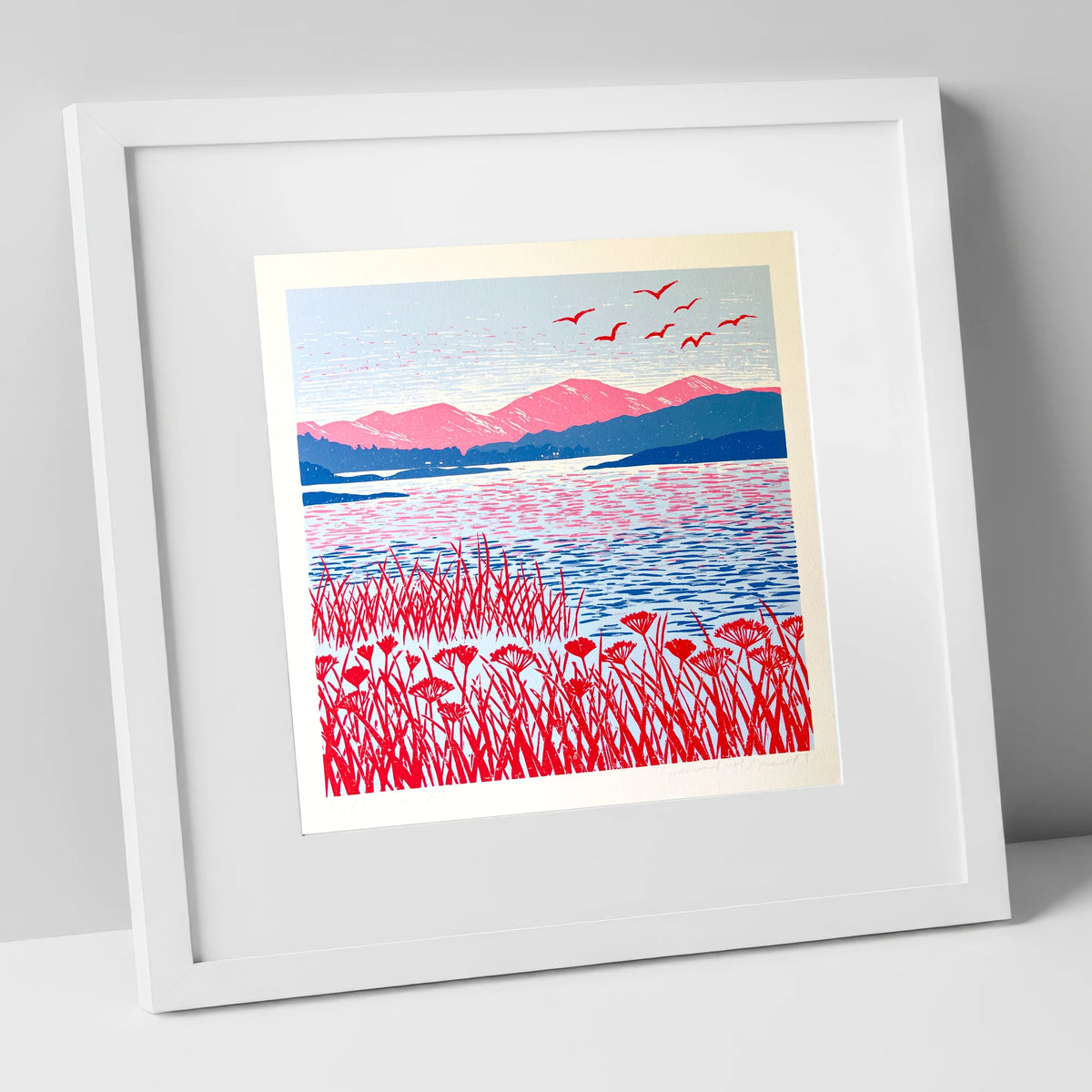 Red Reeds Over Coniston Water lake district lake art print in white frame