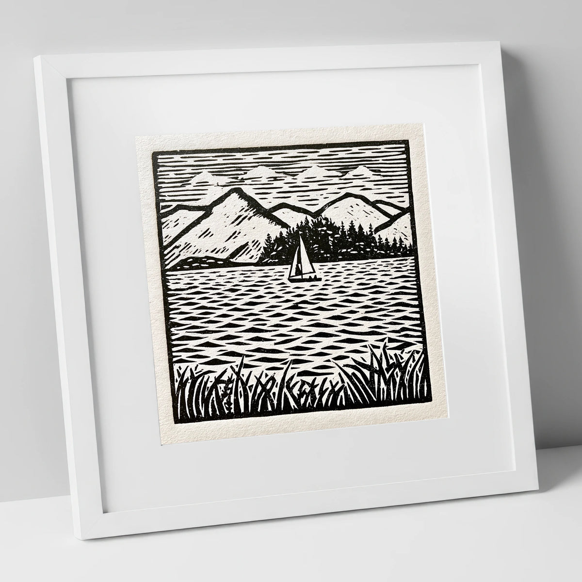 Monochrome Sailboat on Derwentwater lake district lake art print in white frame