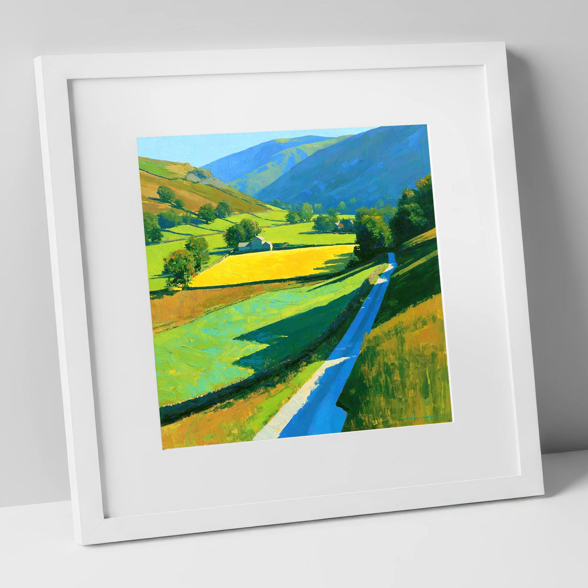 Vibrant Valley Below Blue Fells lake district valley art print in white frame