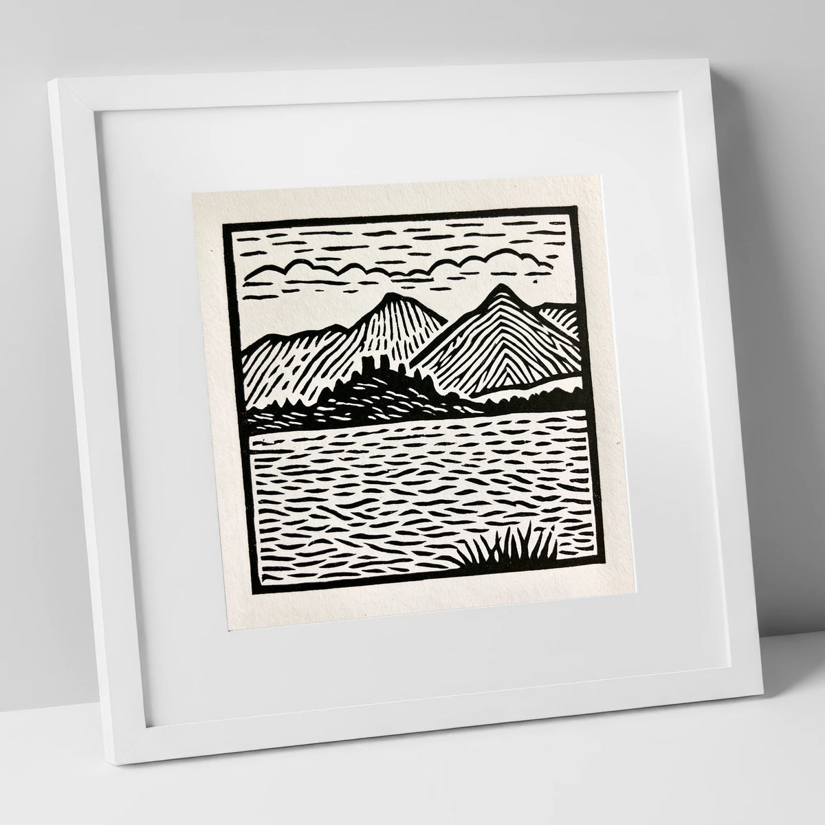 Monochrome Derwentwater Fells lake district lake art print in white frame