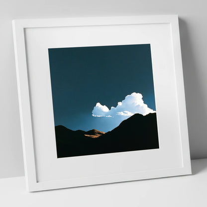 Storm Cloud Over Silhouetted Fells lake district sky art print in white frame