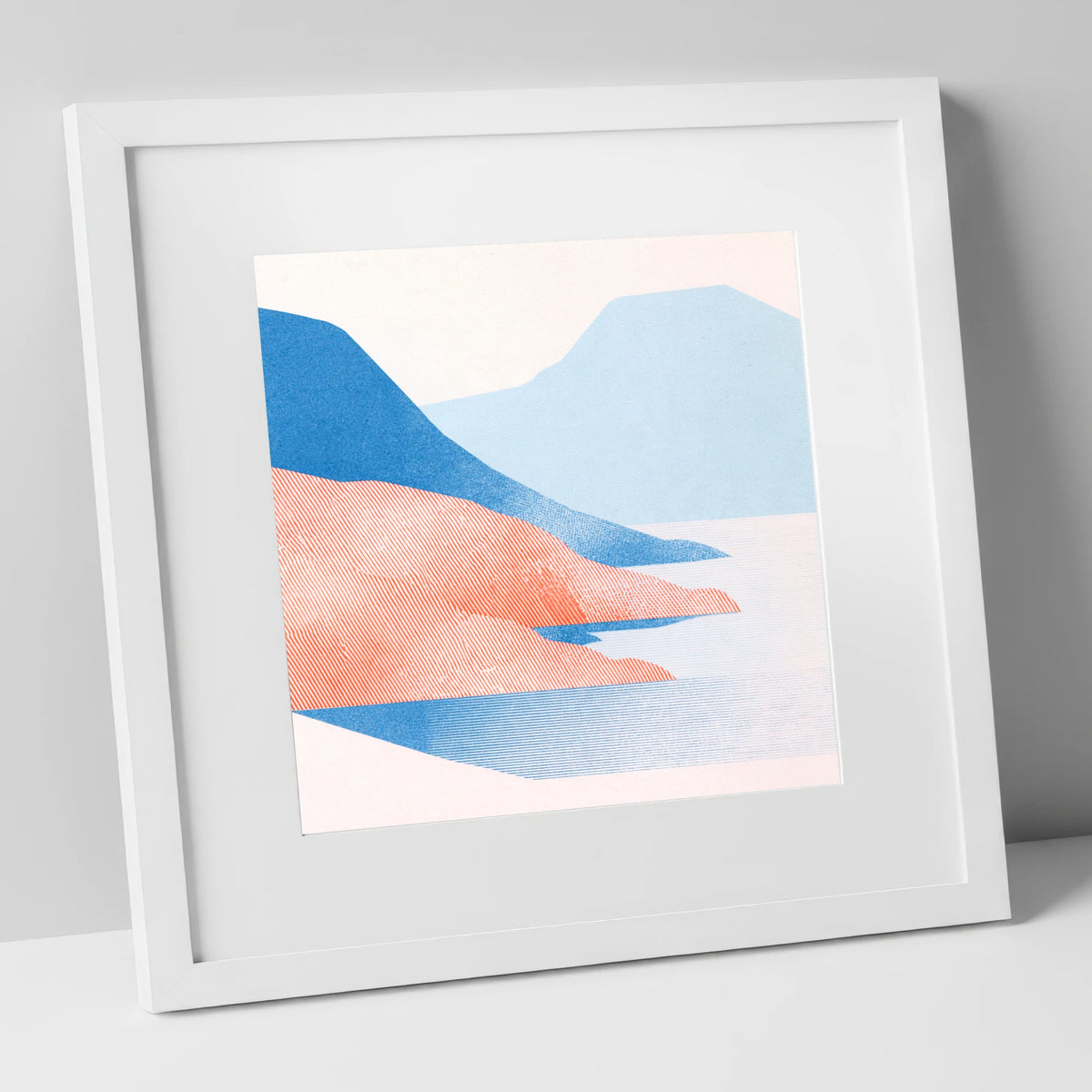 Coniston Water in Coral and Blue lake district lake art print in white frame