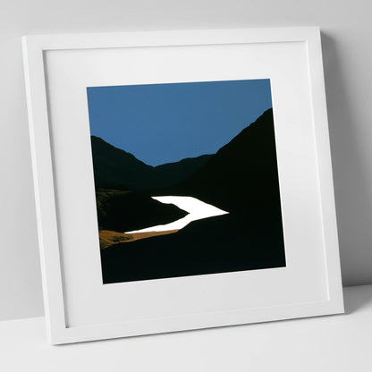 Luminous Lake Below Dark Fells lake district lake art print in white frame