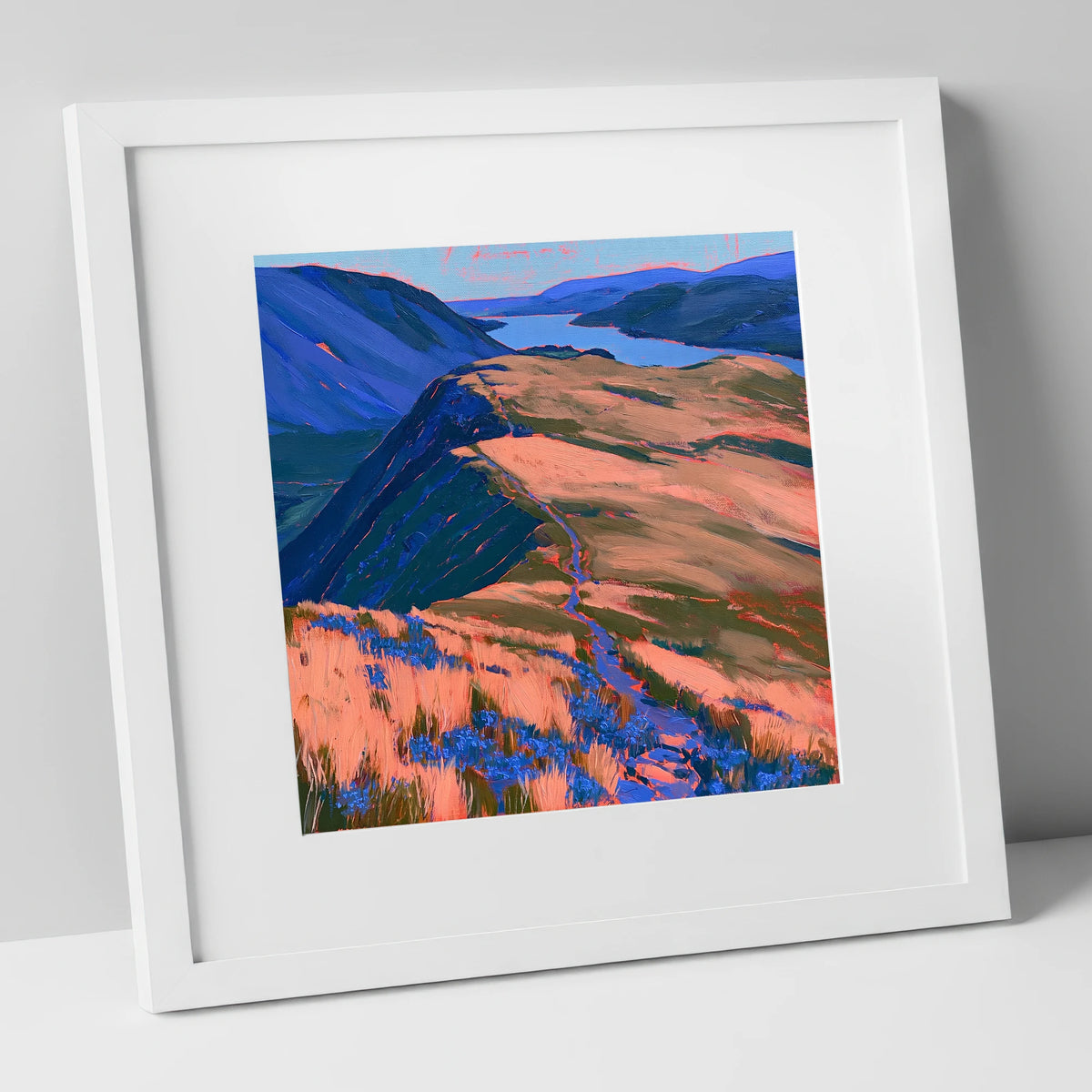 Beda Fell Ridge in Coral Light lake district village art print in white frame