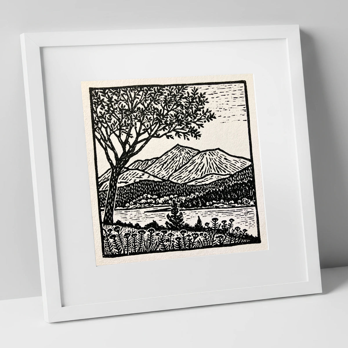 Monochrome Skiddaw and Lake lake district fell art print in white frame