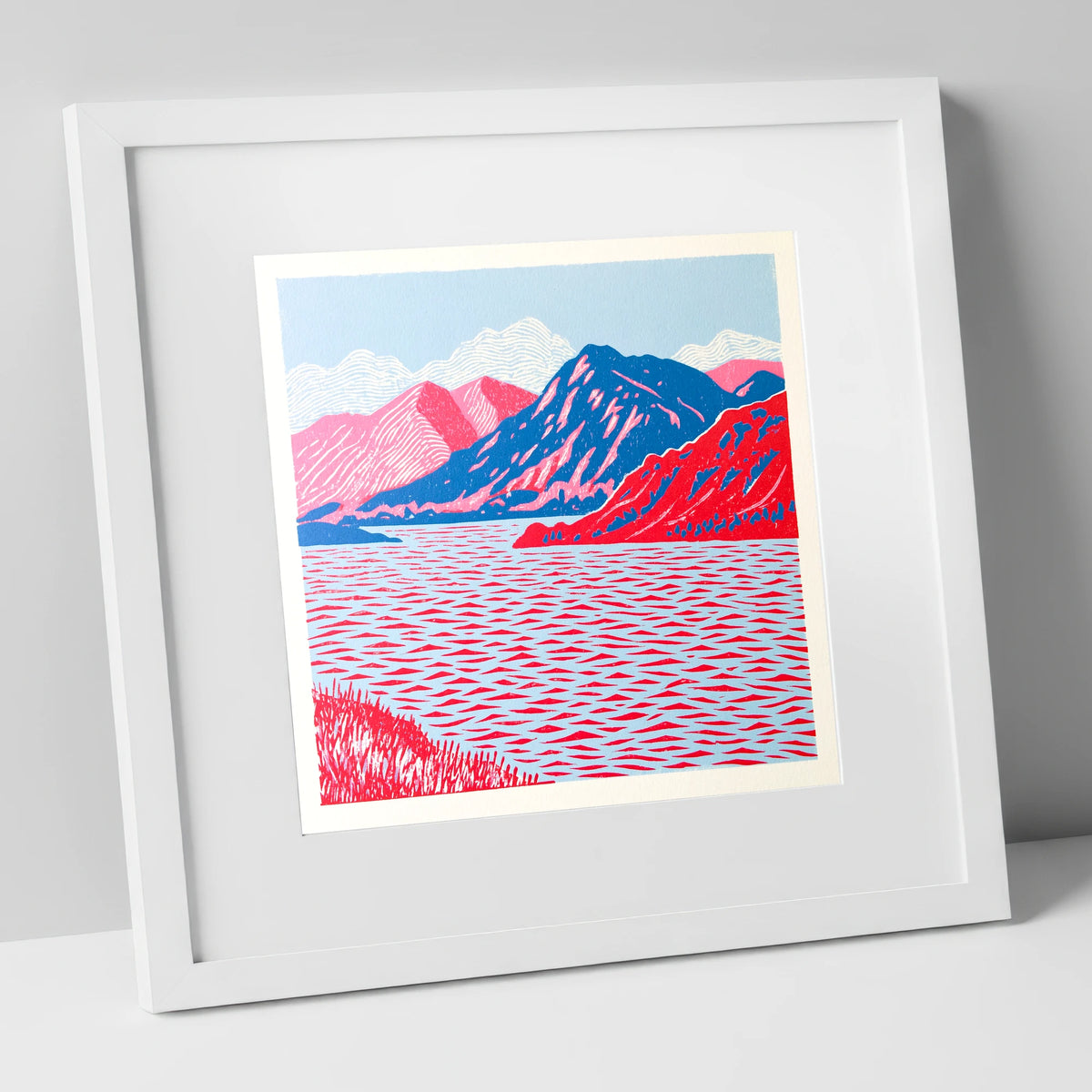 Ullswater in Vivid Red and Blue lake district lake art print in white frame