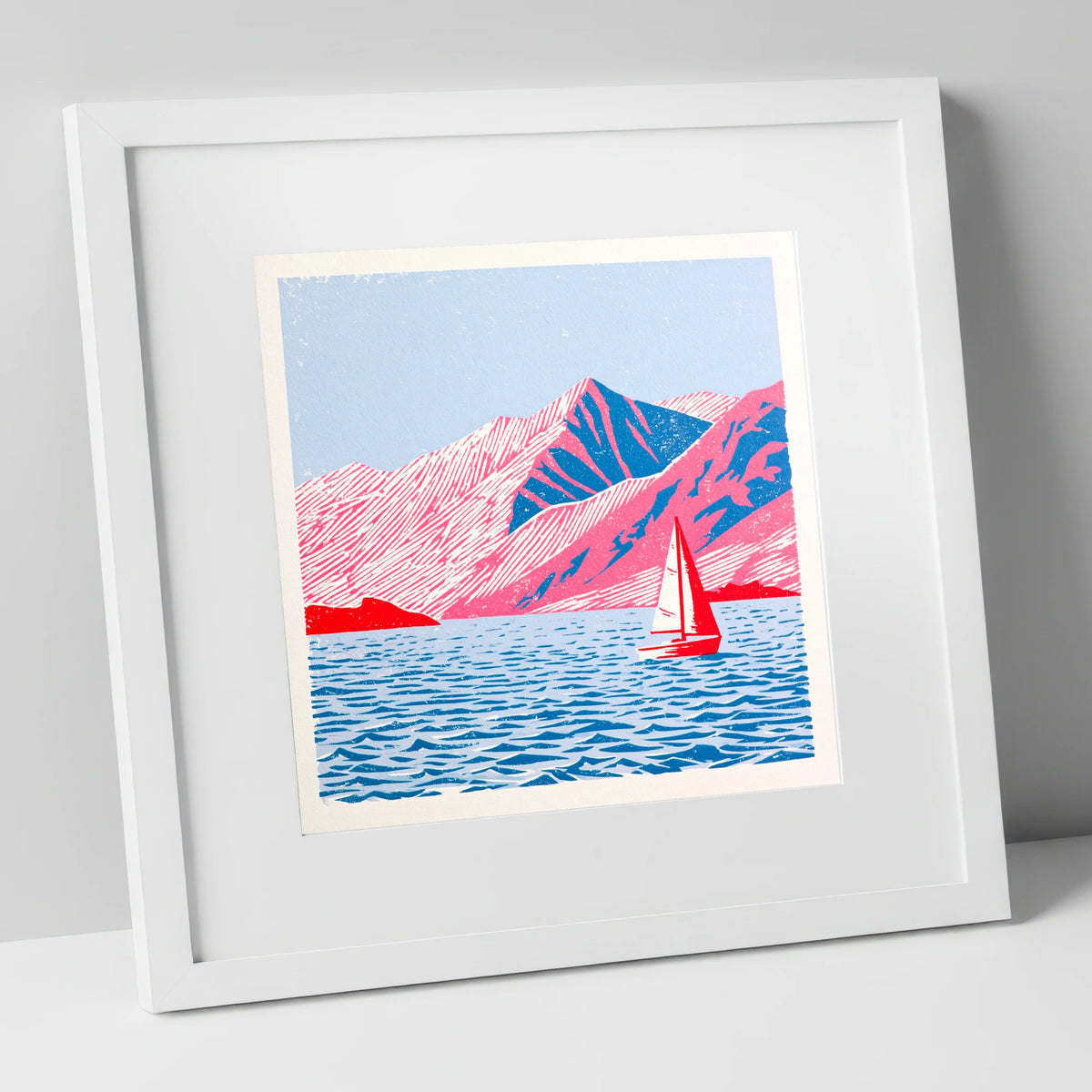 Red Sailboat on Vibrant Ullswater lake district lake art print in white frame