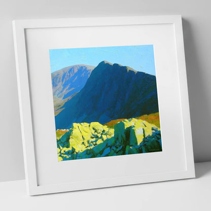 Sunlit Rocks on Great Carrs lake district fell art print in white frame