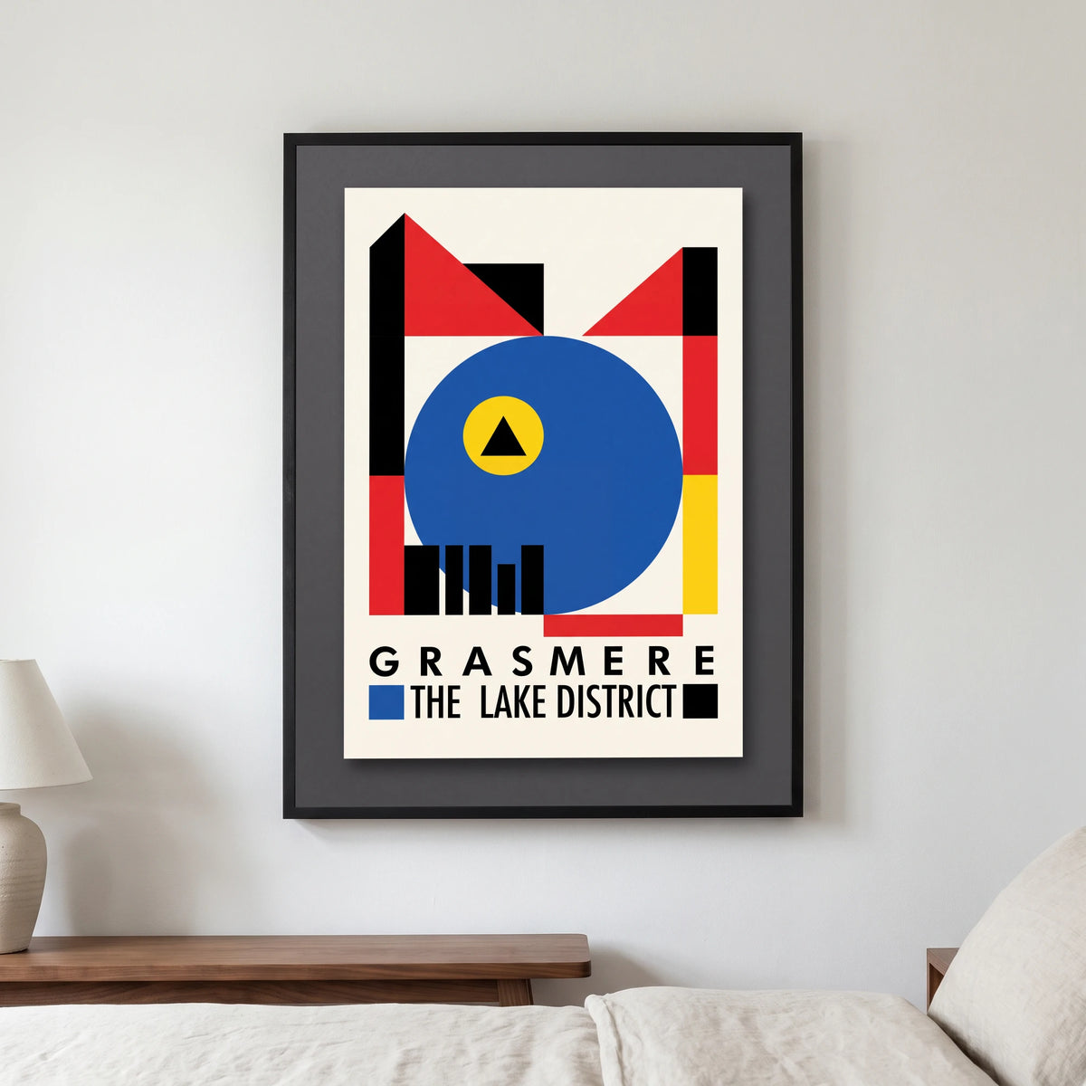 Grasmere travel poster in a black frame, hanging in a bedroom3