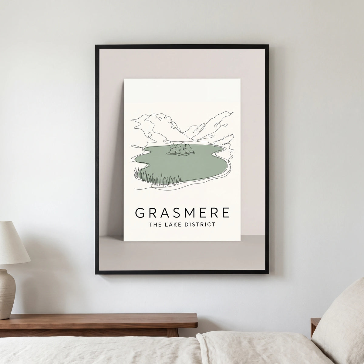 Grasmere travel poster in a black frame, hanging in a bedroom3