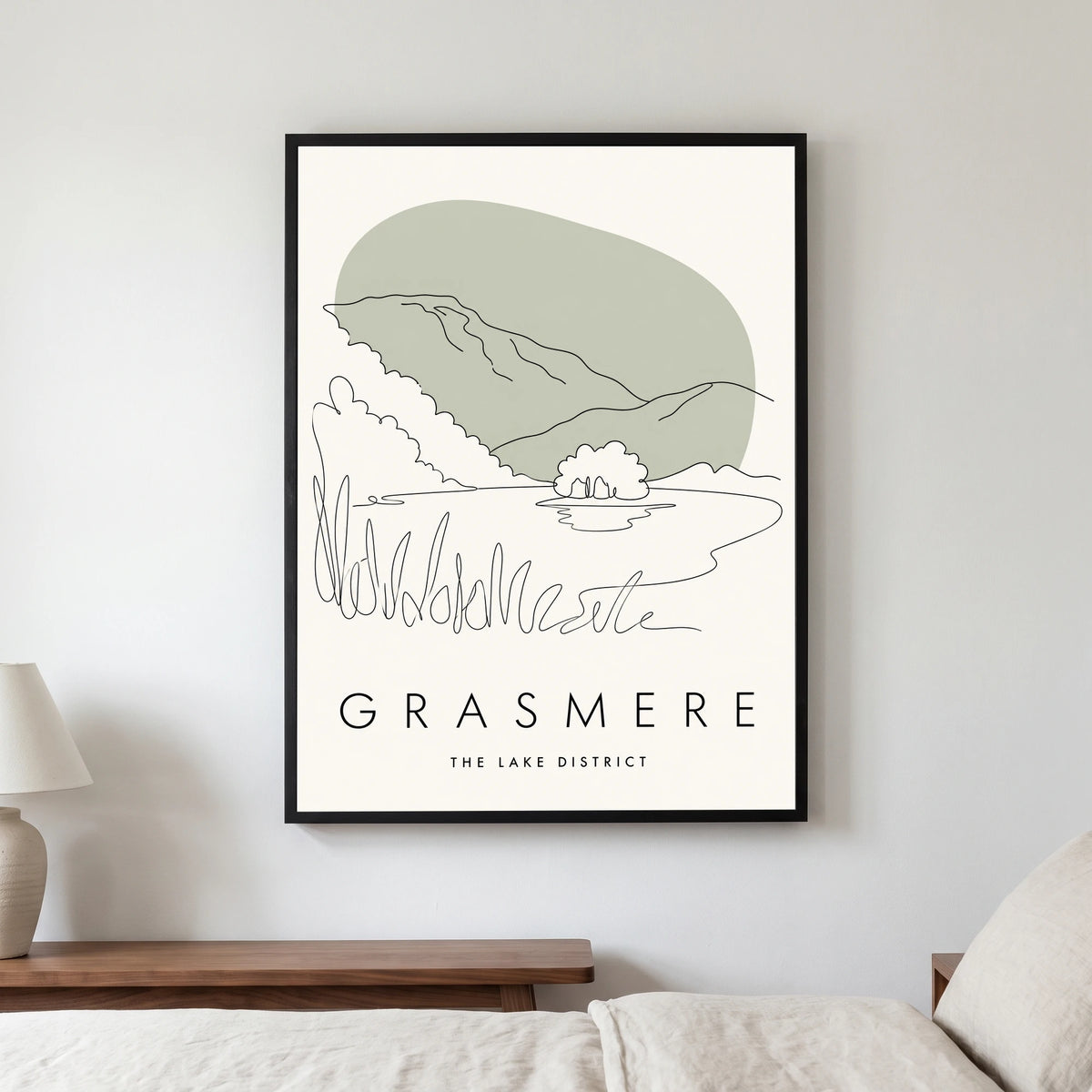 Grasmere travel poster in a black frame, hanging in a bedroom3