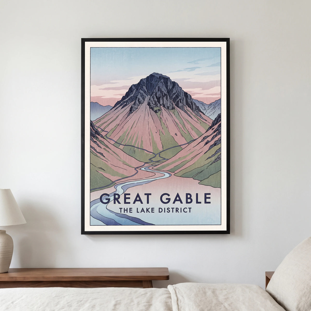 Great Gable travel poster in a black frame, hanging in a bedroom3