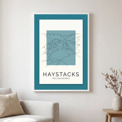 Haystacks travel poster in a white frame, hanging in a living2
