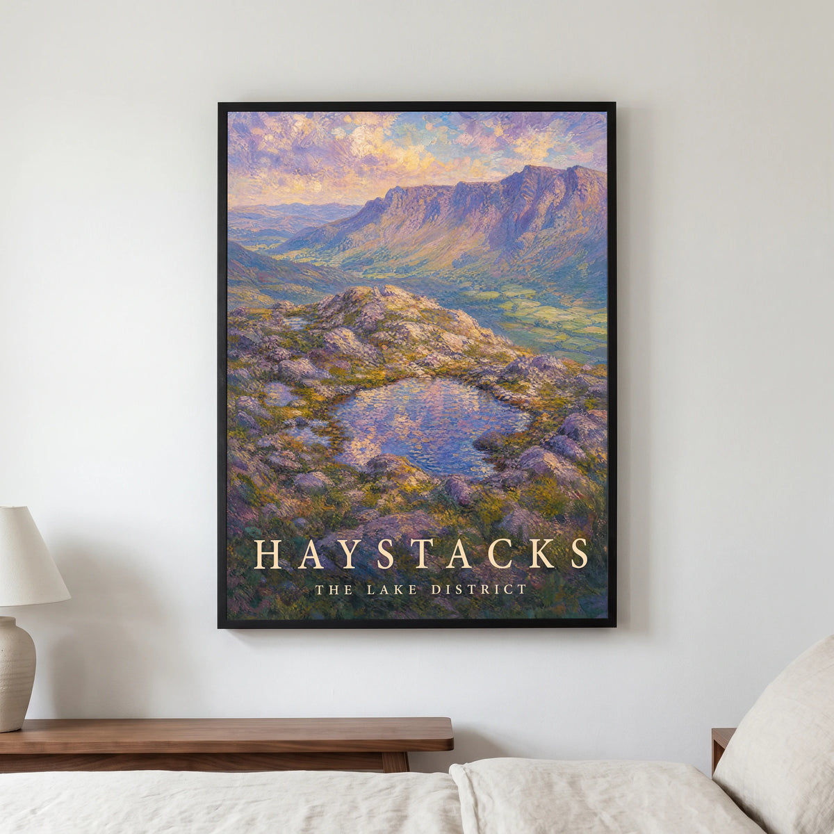 Haystacks travel poster in a black frame, hanging in a bedroom3