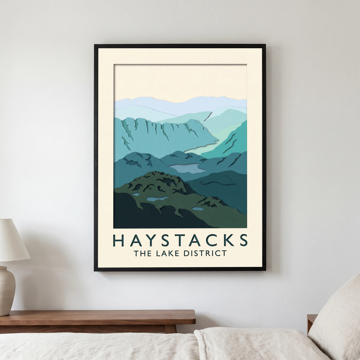 Haystacks travel poster in a black frame, hanging in a bedroom3