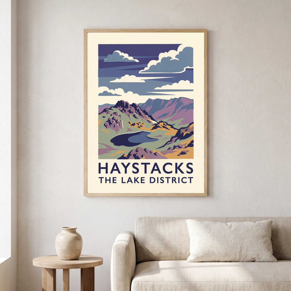 Haystacks travel poster in a natural frame, hanging in a living