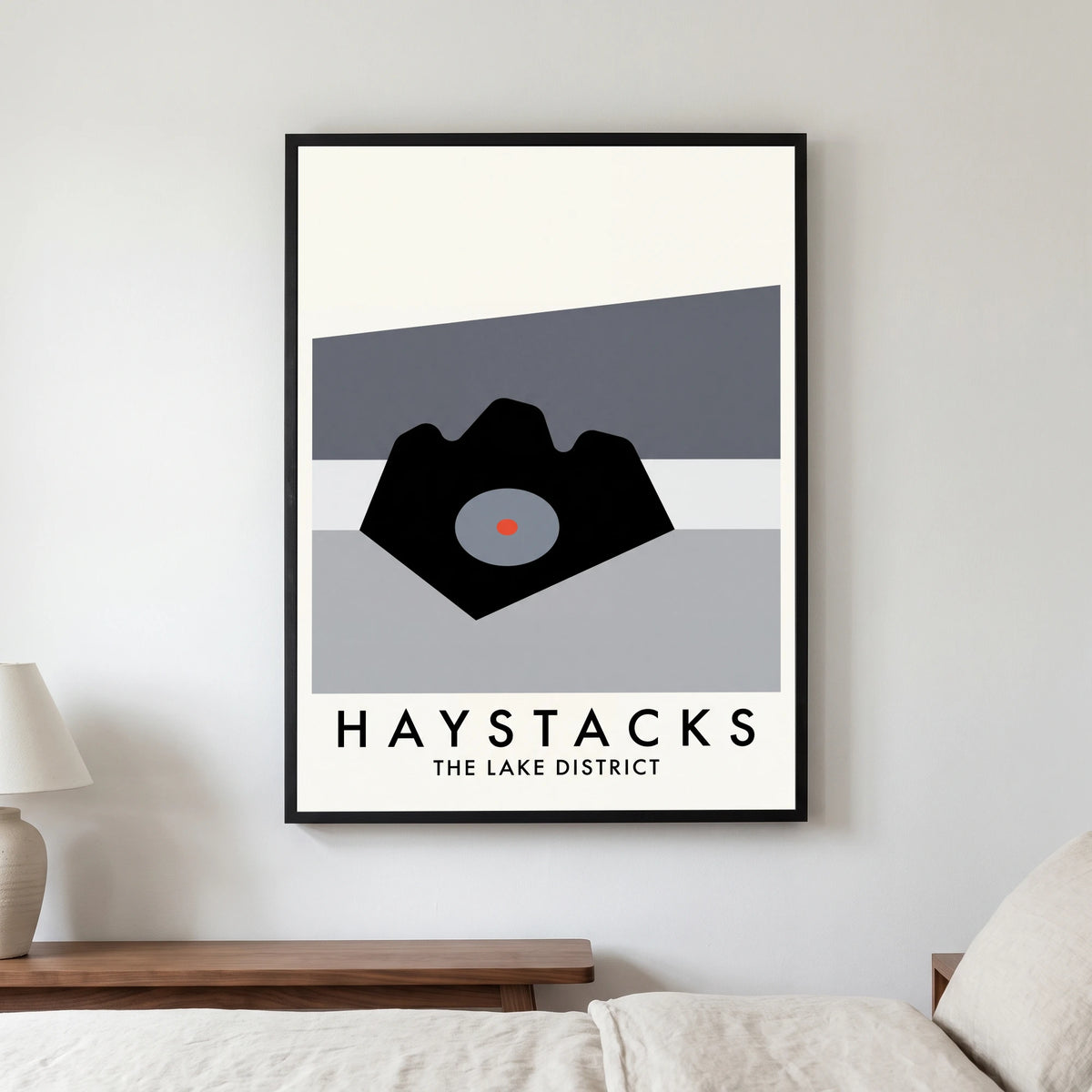 Haystacks travel poster in a black frame, hanging in a bedroom3