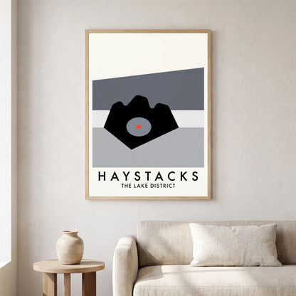 Haystacks travel poster in a natural frame, hanging in a living