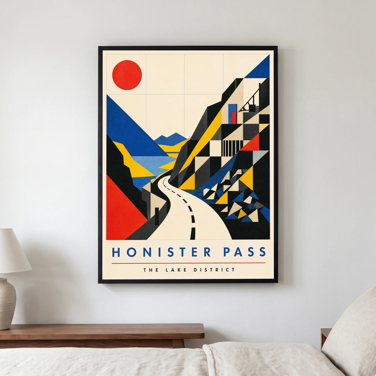 Honister Pass travel poster in a black frame, hanging in a bedroom3