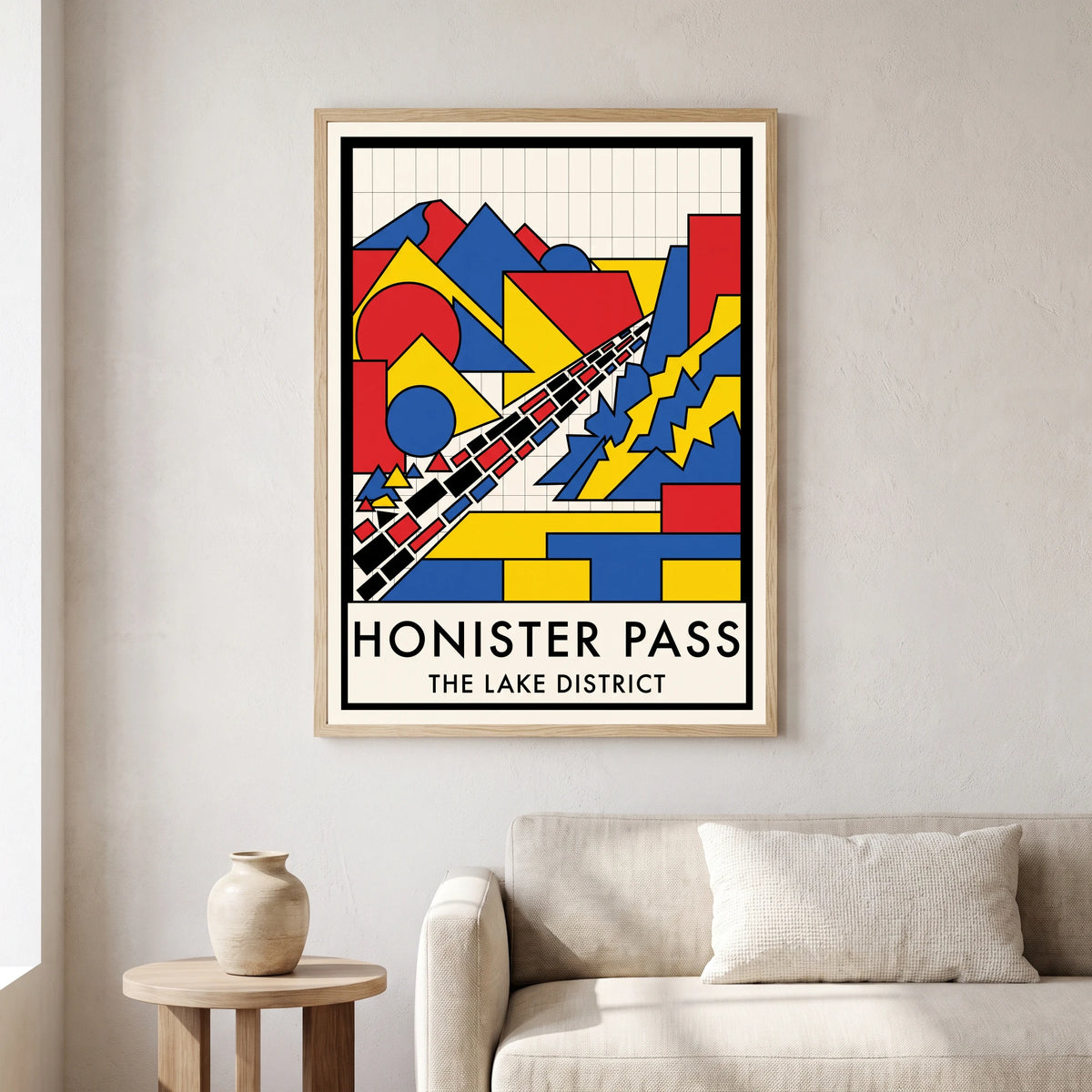 Honister Pass travel poster in a natural frame, hanging in a living