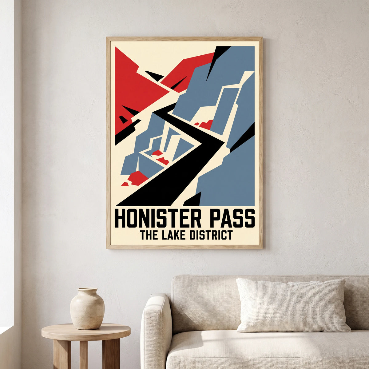 Honister Pass travel poster in a natural frame, hanging in a living